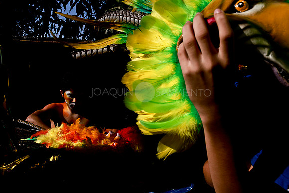 Ravers of the Selva Africana Group prepare before the Battle of the Flowers parade during Barranquillas Carnival